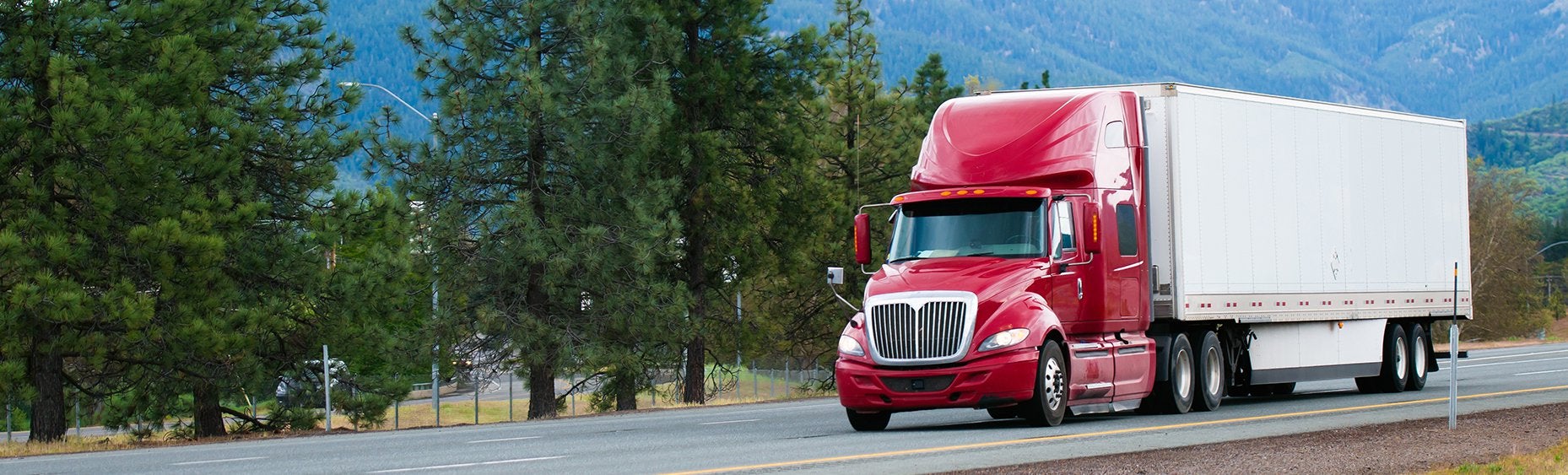 Tractor-trailer training truck on a two-lane road